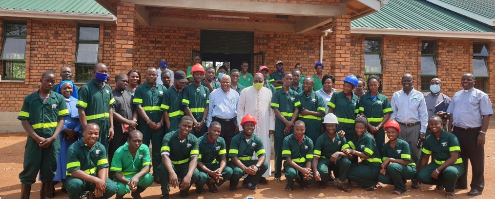 A group shot of BLI graduates, all smiling